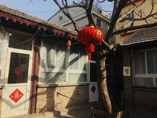  “協(xié)作者”除夕陪伴社區(qū)孤寡老人迎春來